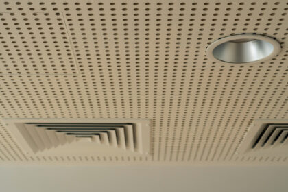 White,Sound,Absorption,Ceiling,With,Duct,Grilles,And,Lights