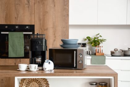 Microwave,Oven,,Coffee,Machine,,Mixer,And,Set,Of,Plates,On