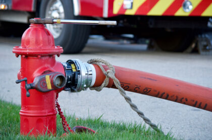 Fire,Hydrant,In,Use,During,A,Structure,Fire