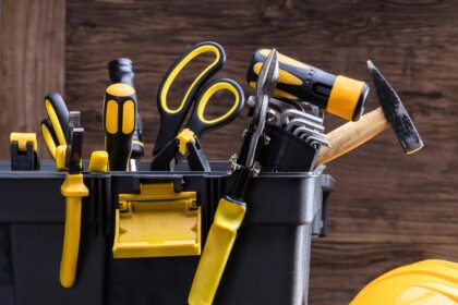 Safety,Equipment’s,Near,Toolbox,With,Various,Work,Tools,On,Wooden