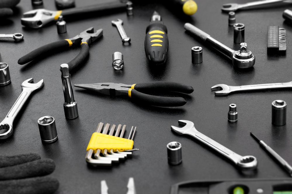 Many,Different,Tools,For,Repair,Work,On,A,Black,Background.
