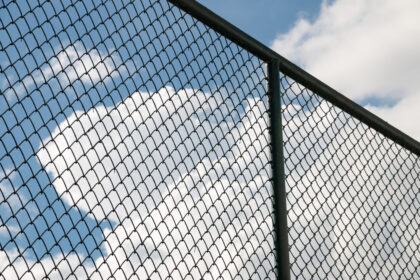 Steel,Mesh,At,Tennis,Court,In,University,Stadium