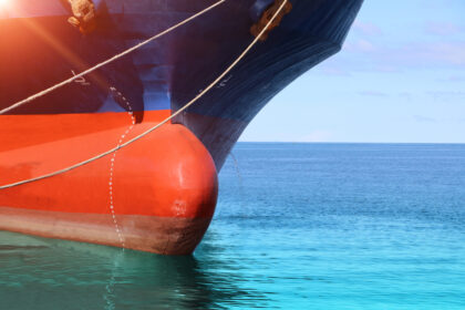 Cargo,Ship,Moored,And,Mooring,Bollard,With,A,Fixed,Rope