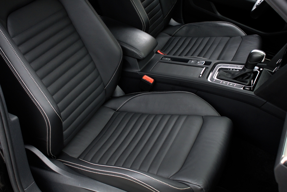 Front,Seats,Of,A,Modern,Passenger,Car.,Black,Leather,Interior