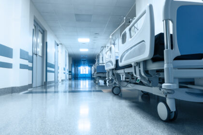 Long corridor in hospital with surgical transport.