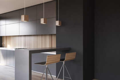 White wooden kitchen, gray countertops side