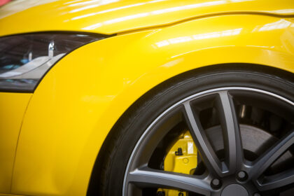 Close,Up,Shot,Of,A,Yellow,Car,Rim.