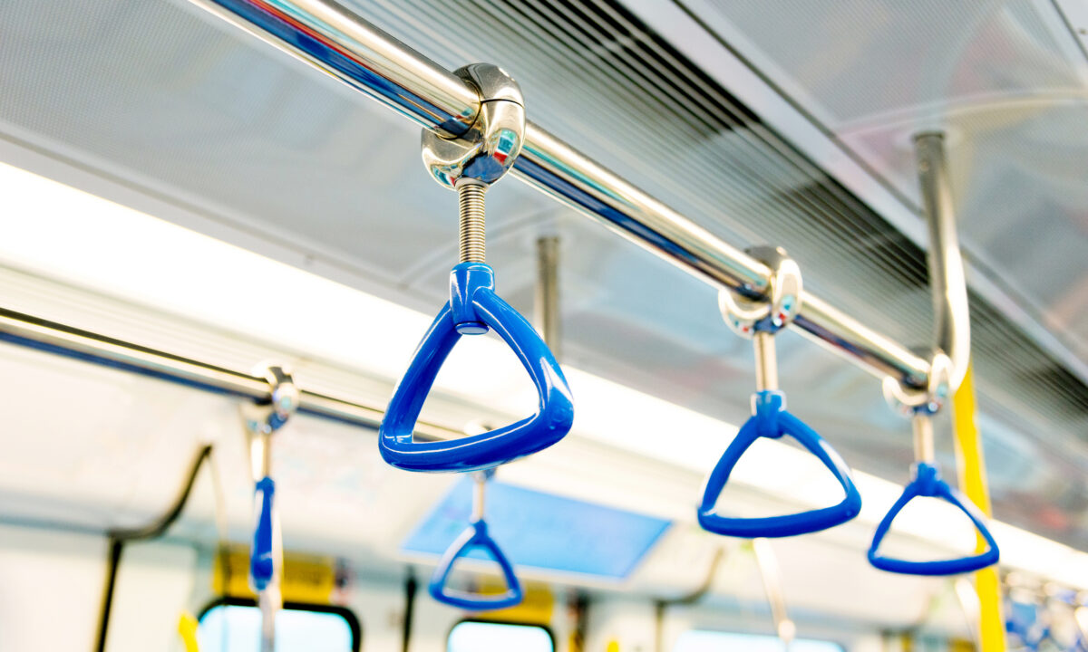 Blue empty handle in the bus