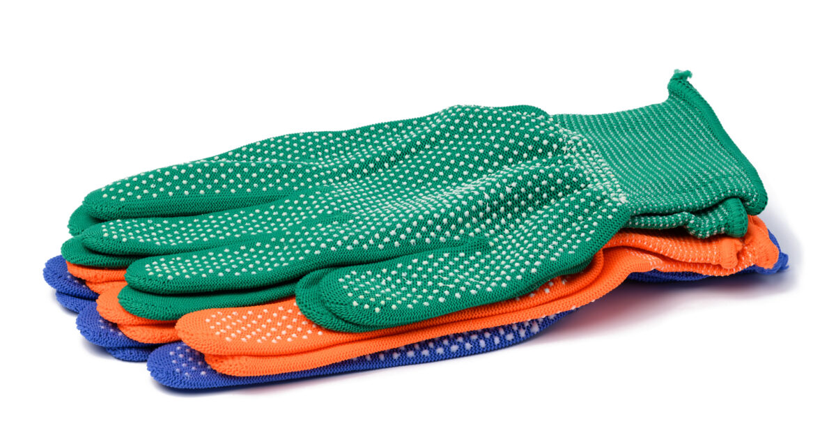 Textile work gloves on a white background. Protective clothing for manual workers
